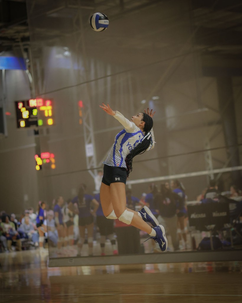 575 player attacking at the net