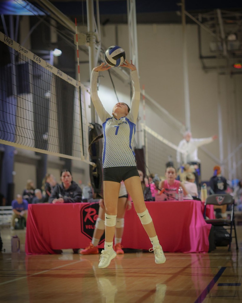 575 player jumping to play the ball